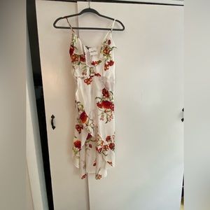 Hi-Low dress with built in shorts. Never worn.